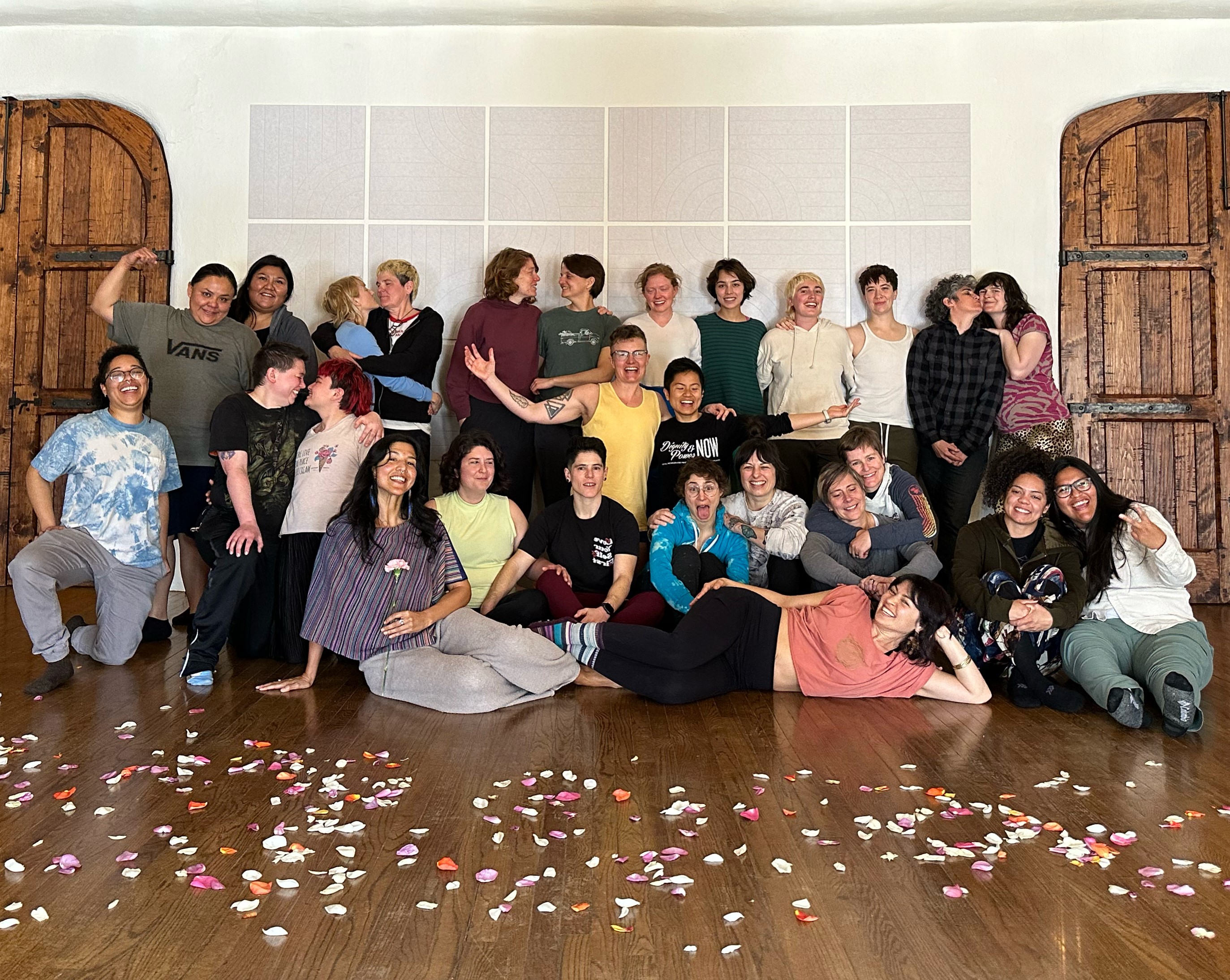 Queer Couples Yoga Retreat 2025 images of partner yoga, LGBTQIA connection, massage, and relaxation.