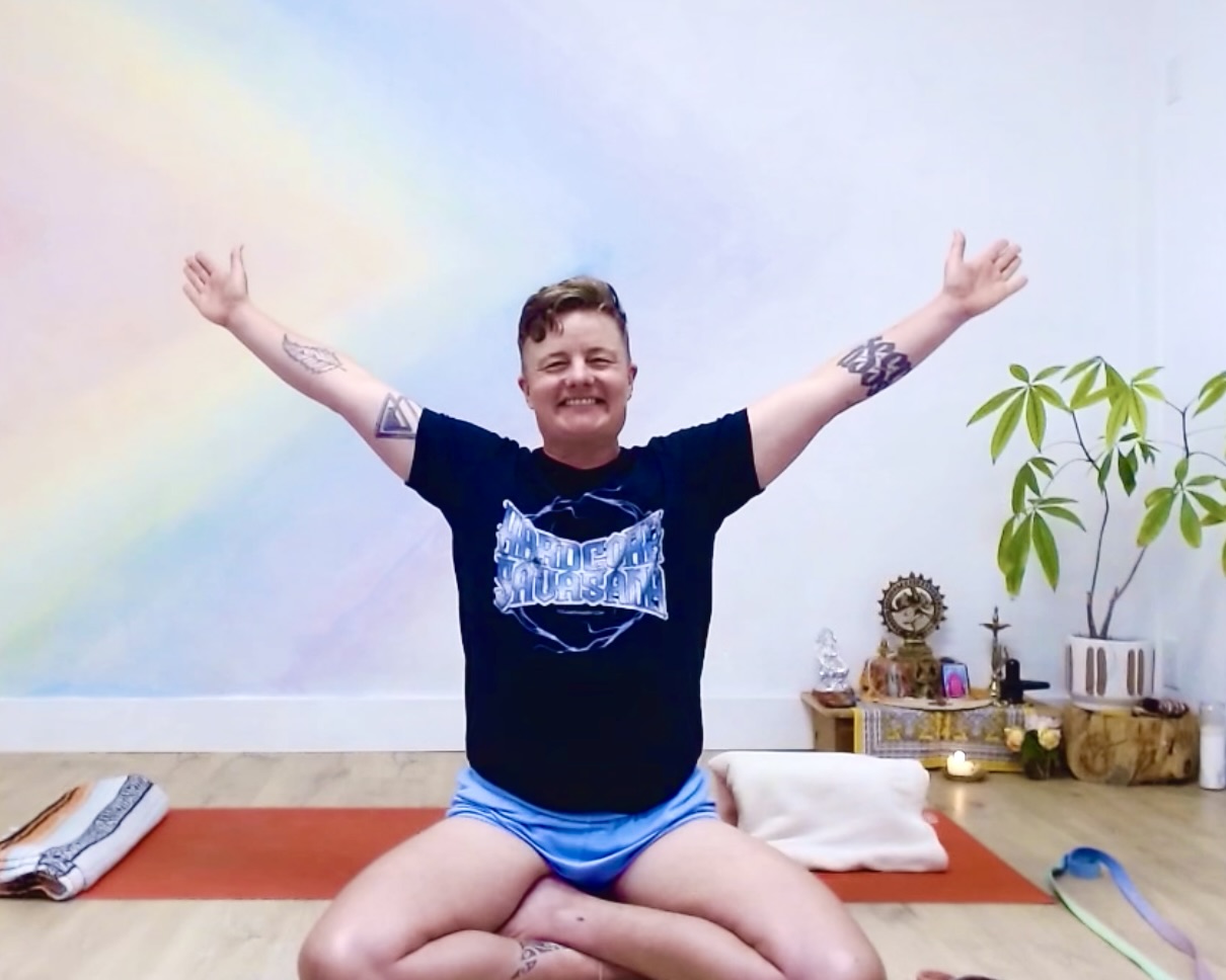 Avery Kalapa teaching queer and trans affirming Iyengar Yoga online