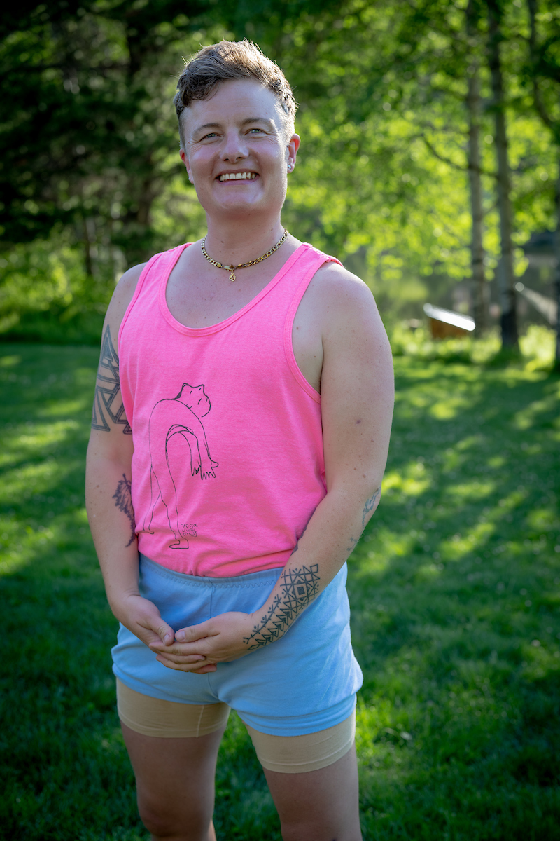 Photo of queer trans Iyengar Yoga instructor and lead teacher at Sadhana Support Collective, Avery Janeczek Kalapa. Photo by Kelly Fogel. 
